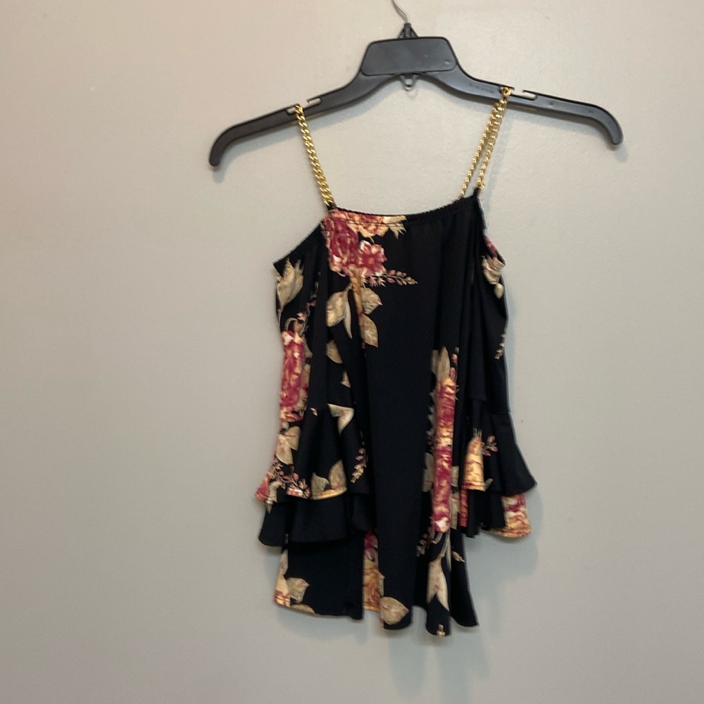 Cold shoulder blouse with bell sleeves and gold chain straps